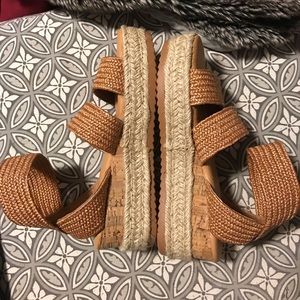 Never worn before size 7 platform sandals